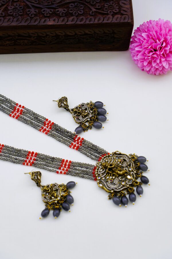 Ash and Red Onyx Bead long Designer Haram with Antique Krishna Pendent